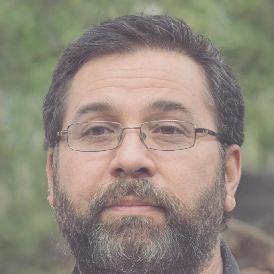 Rupert Ashford working at desk reviewing search algorithm updates