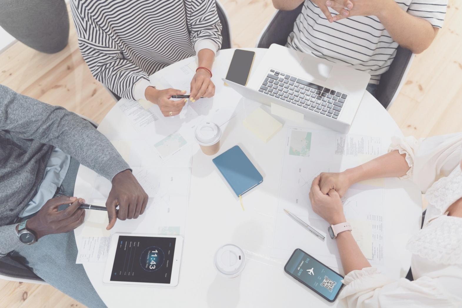 Modern workspace with SEO analytics dashboard displayed on computer screens